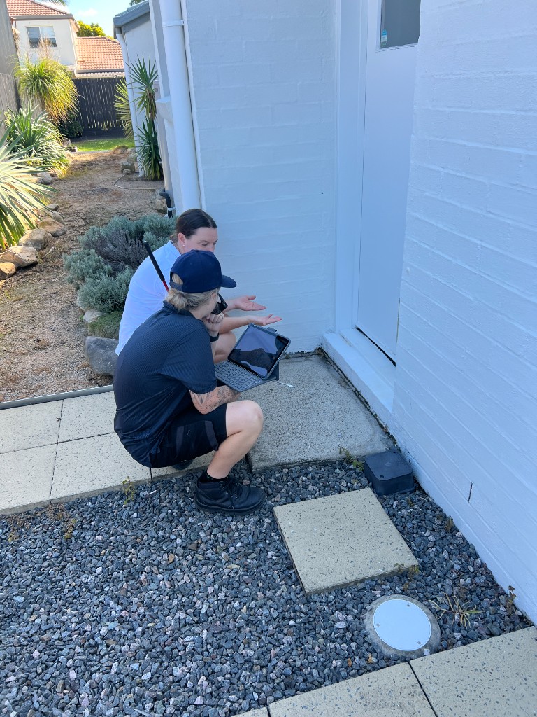 Map-style visual: pest control technician on site representing service coverage across New South Wales